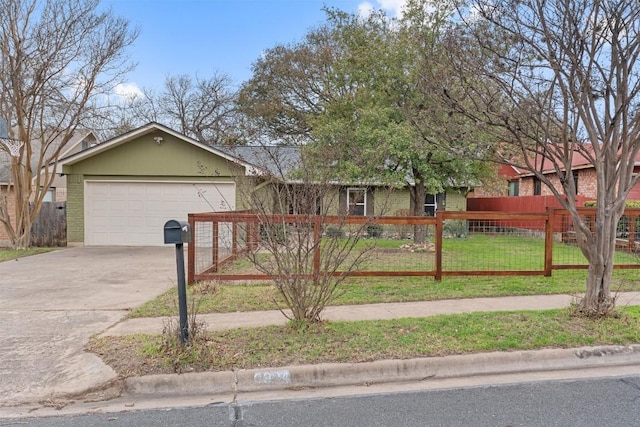 ranch-style home featuring a fenced front yard, an attached garage, brick siding, driveway, and a front lawn