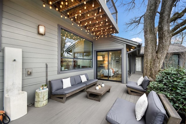 wooden terrace featuring outdoor lounge area