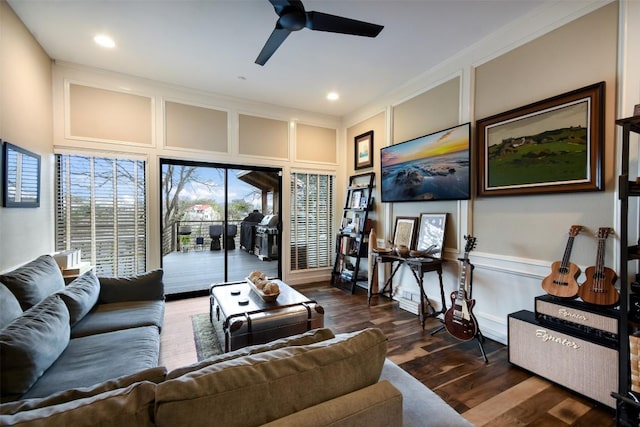 living room with dark wood-style flooring, recessed lighting, a ceiling fan, and a decorative wall