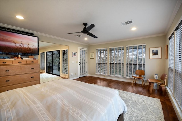 bedroom featuring crown molding, wood finished floors, visible vents, and access to exterior