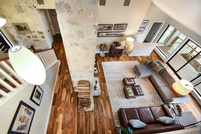 living room with wood finished floors and visible vents