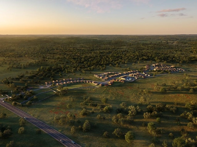 aerial view at dusk with a rural view