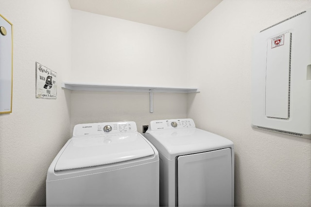 laundry area with laundry area and washing machine and clothes dryer