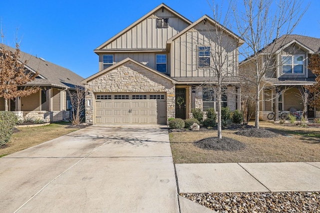 craftsman inspired home featuring an attached garage, stone siding, board and batten siding, and concrete driveway