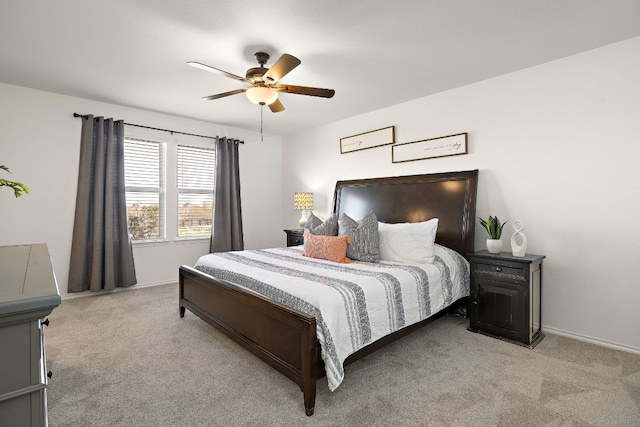 217 Bonnet Blvd, Georgetown, TX 78628 - bedroom with light colored carpet, baseboards, and ceiling fan