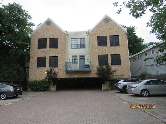 2300 Leon St Unit 202, Austin, TX 78705 - view of front of home with uncovered parking and brick siding