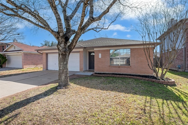 single story home with driveway, brick siding, a shingled roof, an attached garage, and a front yard