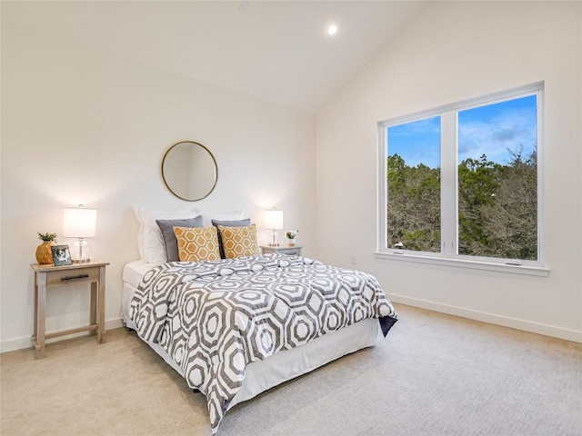 bedroom featuring lofted ceiling, recessed lighting, baseboards, and light colored carpet