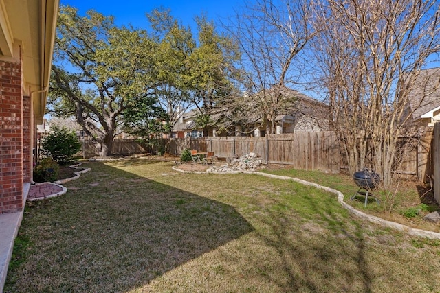 view of yard featuring a fenced backyard