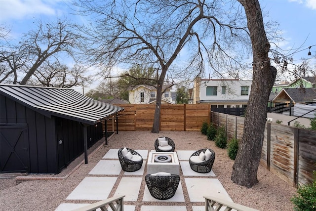 view of patio featuring a fenced backyard and an outdoor living space