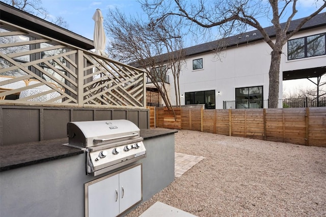 view of patio / terrace with fence private yard, grilling area, and area for grilling