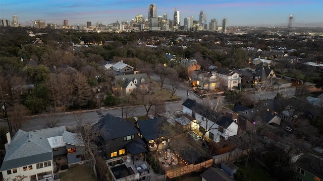 birds eye view of property featuring a view of city