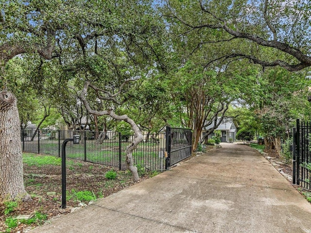 view of gate featuring fence