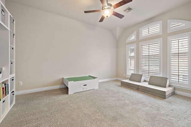 playroom with a healthy amount of sunlight, carpet floors, baseboards, and visible vents