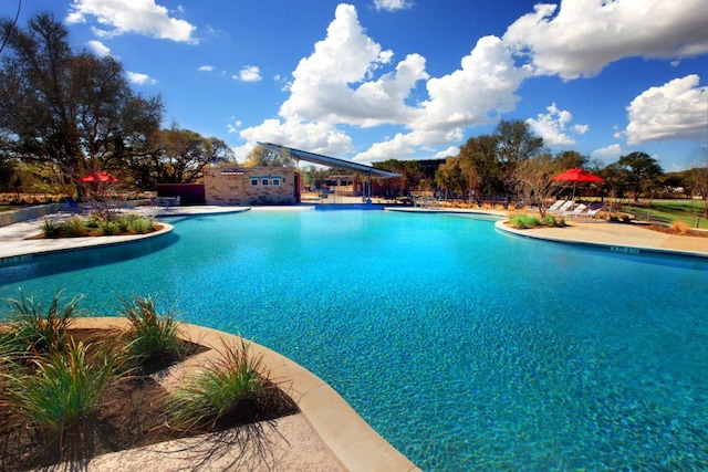 pool with a patio area