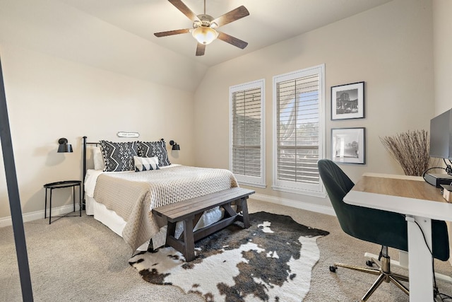 bedroom featuring ceiling fan, baseboards, vaulted ceiling, and carpet flooring