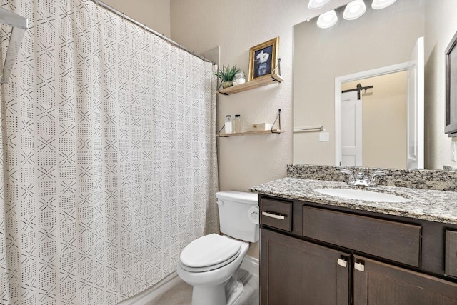 full bath featuring toilet, curtained shower, and vanity