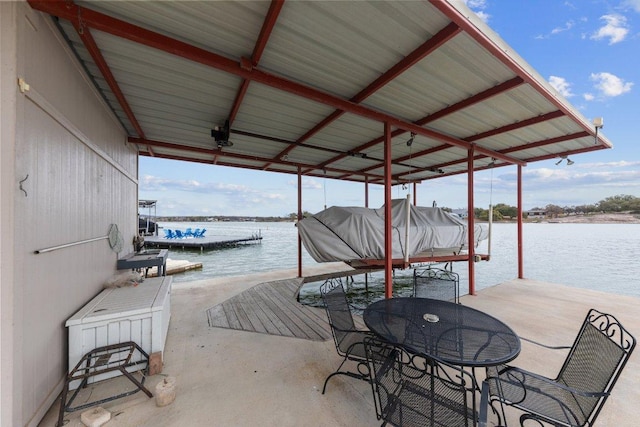 view of dock featuring a water view and boat lift