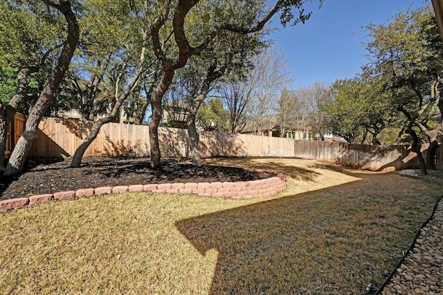 view of yard featuring a fenced backyard