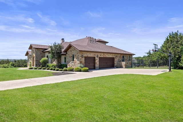 french provincial home featuring a garage, fence, driveway, stone siding, and a front yard