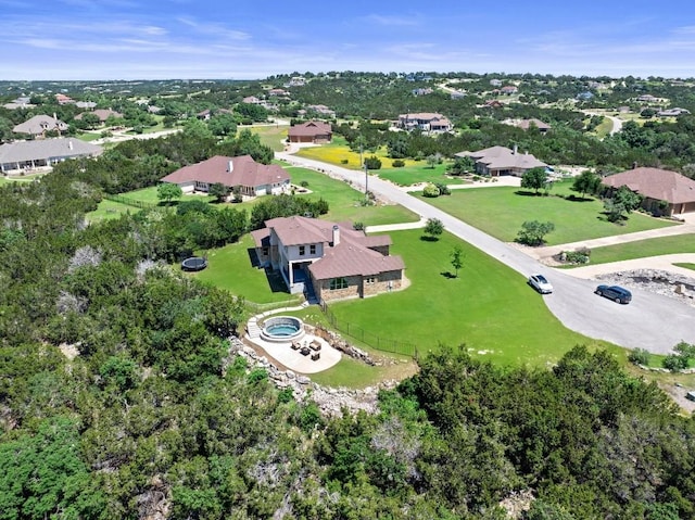 1104 Squaw Vly, Leander, TX 78641 - aerial view of residential area with a tree filled landscape