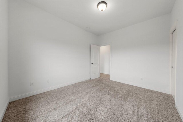 1104 Squaw Vly, Leander, TX 78641 - carpeted empty room with baseboards