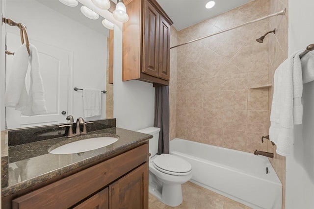 bathroom featuring tile patterned floors, vanity, toilet, and shower / tub combo with curtain