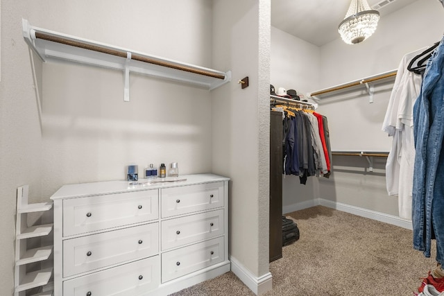 spacious closet featuring carpet floors