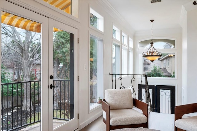 interior space with visible vents and french doors