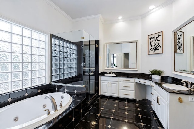 full bathroom with a healthy amount of sunlight, crown molding, and vanity