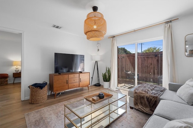 1422 Collier St Unit 102, Austin, TX 78704 - living area featuring wood finished floors and baseboards