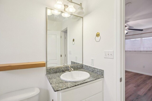 1422 Collier St Unit 102, Austin, TX 78704 - bathroom with vanity, wood finished floors, and ceiling fan