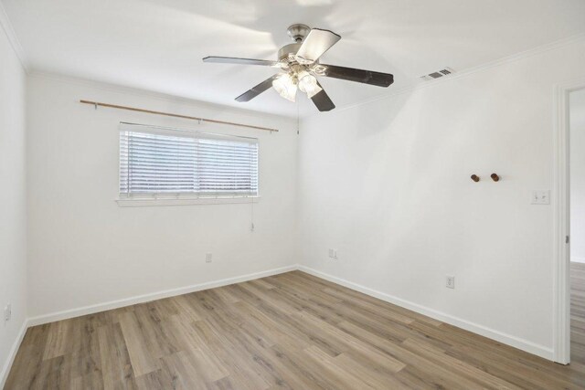1422 Collier St Unit 102, Austin, TX 78704 - unfurnished room with crown molding, light wood-style flooring, and ceiling fan