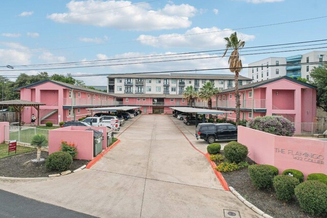 1422 Collier St Unit 102, Austin, TX 78704 - view of partially covered parking lot