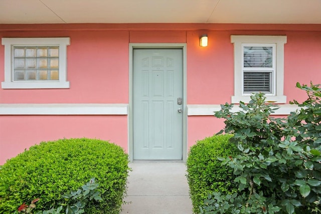 1422 Collier St Unit 102, Austin, TX 78704 - doorway to property with stucco siding