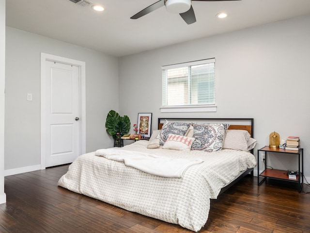 bedroom with ceiling fan, baseboards, hardwood / wood-style floors, and recessed lighting