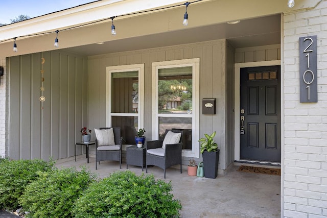 2101 Falcon Hill Dr, Austin, TX 78745 - view of exterior entry with covered porch and brick siding