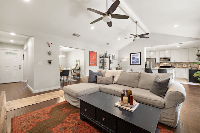2101 Falcon Hill Dr, Austin, TX 78745 - living room featuring a ceiling fan, recessed lighting, dark wood finished floors, and baseboards