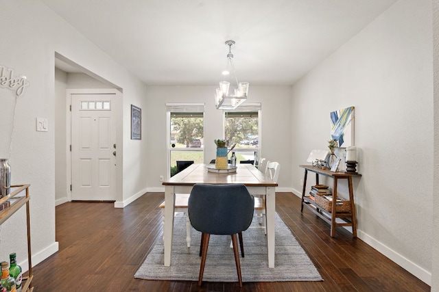 2101 Falcon Hill Dr, Austin, TX 78745 - dining room featuring dark wood-style floors and a chandelier