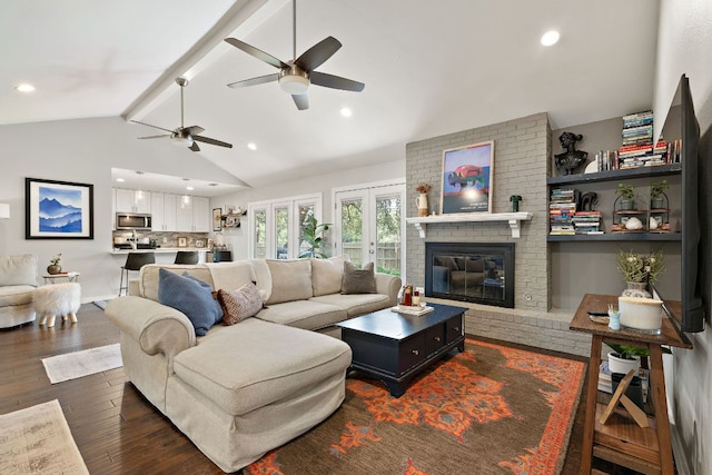 2101 Falcon Hill Dr, Austin, TX 78745 - living room with a ceiling fan, dark wood finished floors, a brick fireplace, and recessed lighting