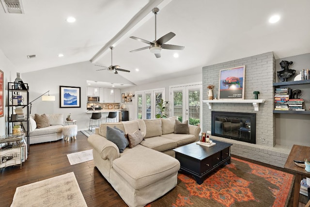 2101 Falcon Hill Dr, Austin, TX 78745 - living room featuring a ceiling fan, dark wood-style flooring, a brick fireplace, and recessed lighting