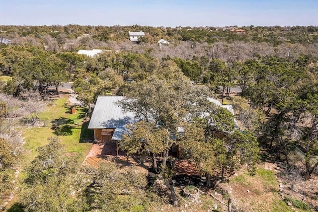 bird's eye view featuring a forest view