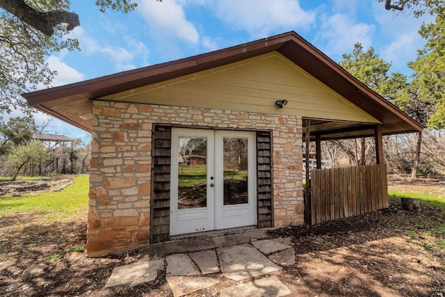 view of outbuilding featuring french doors