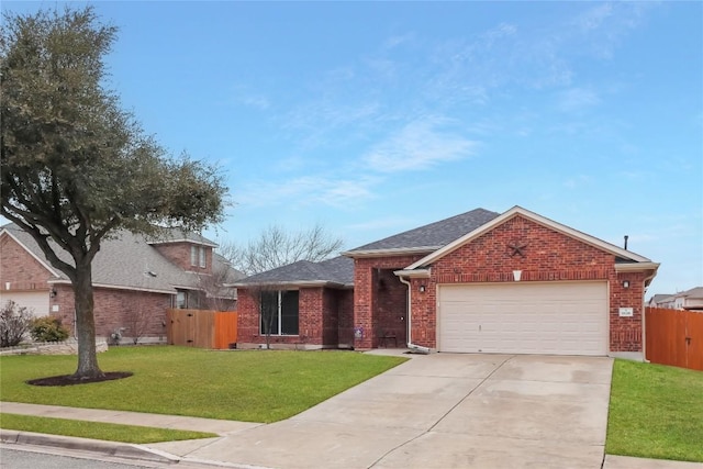 ranch-style home with brick siding, concrete driveway, an attached garage, a front yard, and fence