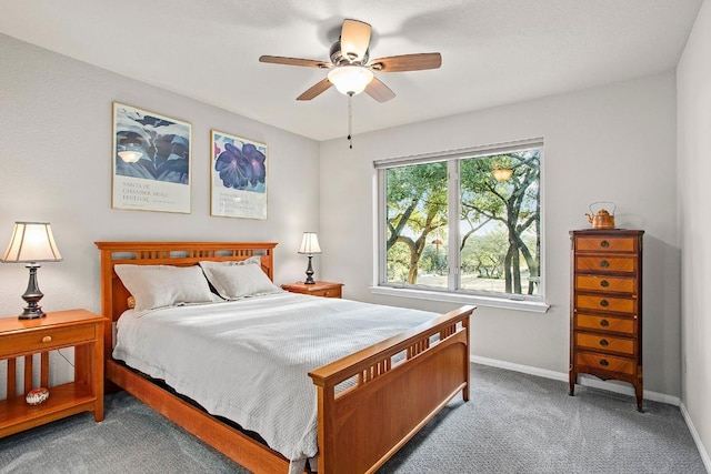 bedroom featuring carpet, a ceiling fan, and baseboards