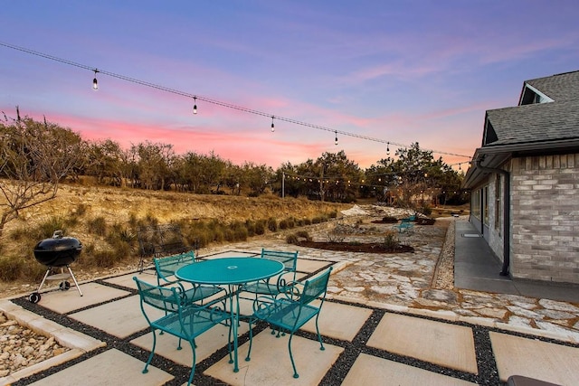 view of patio featuring outdoor dining space and area for grilling