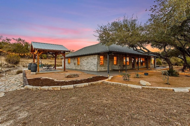 exterior space with a gazebo and a patio area