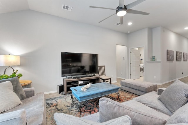 20602 Falcon, Lago Vista, TX 78645 - living area featuring separate washer and dryer, a ceiling fan, recessed lighting, lofted ceiling, and wood finished floors