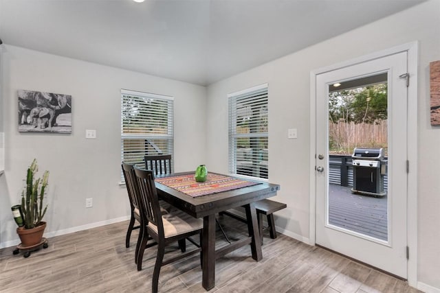 20602 Falcon, Lago Vista, TX 78645 - dining space with light wood finished floors and plenty of natural light