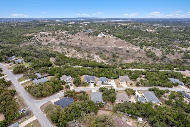 20602 Falcon, Lago Vista, TX 78645 - aerial overview of property's location with nearby suburban area